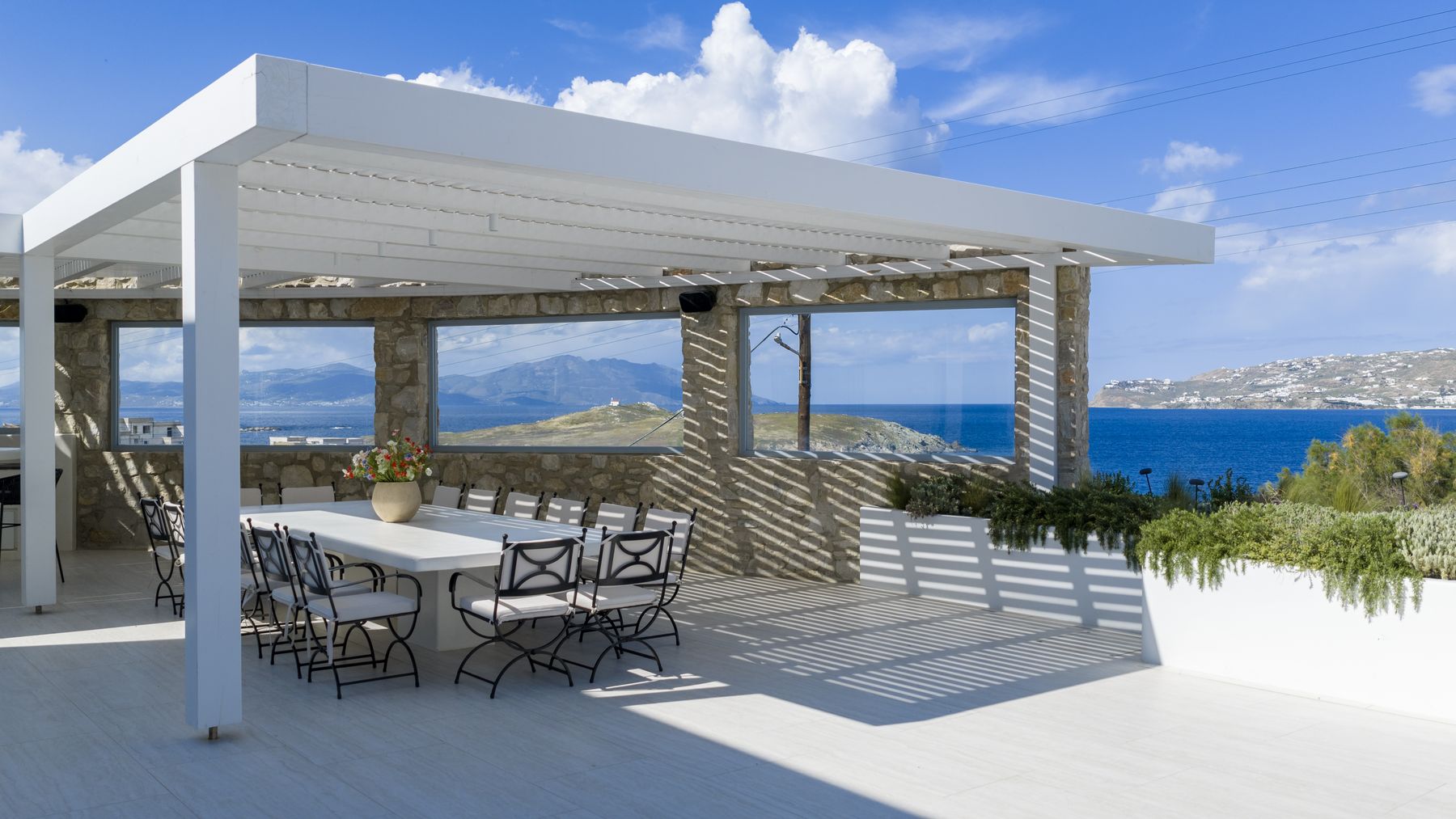 Pergola dining area with sea view